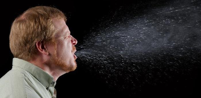 A man sneezing.